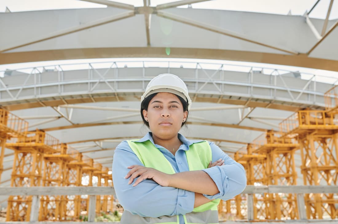 Engineer in high-visibility clothing on an industrial site