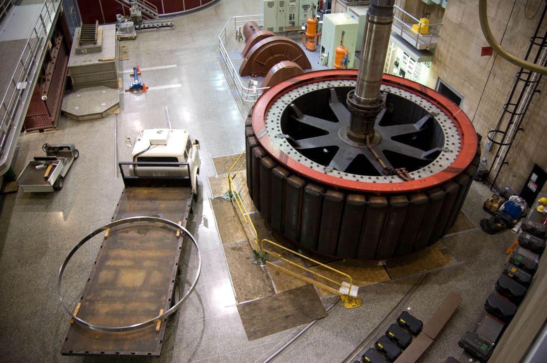 Large machine rotor under overhaul in a workshop